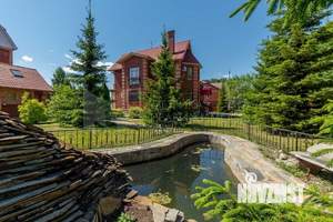 Коттедж 319м², 3-этажный, участок 15 сот.  