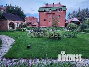 Коттедж 330м², 3-этажный, участок 15 сот.  